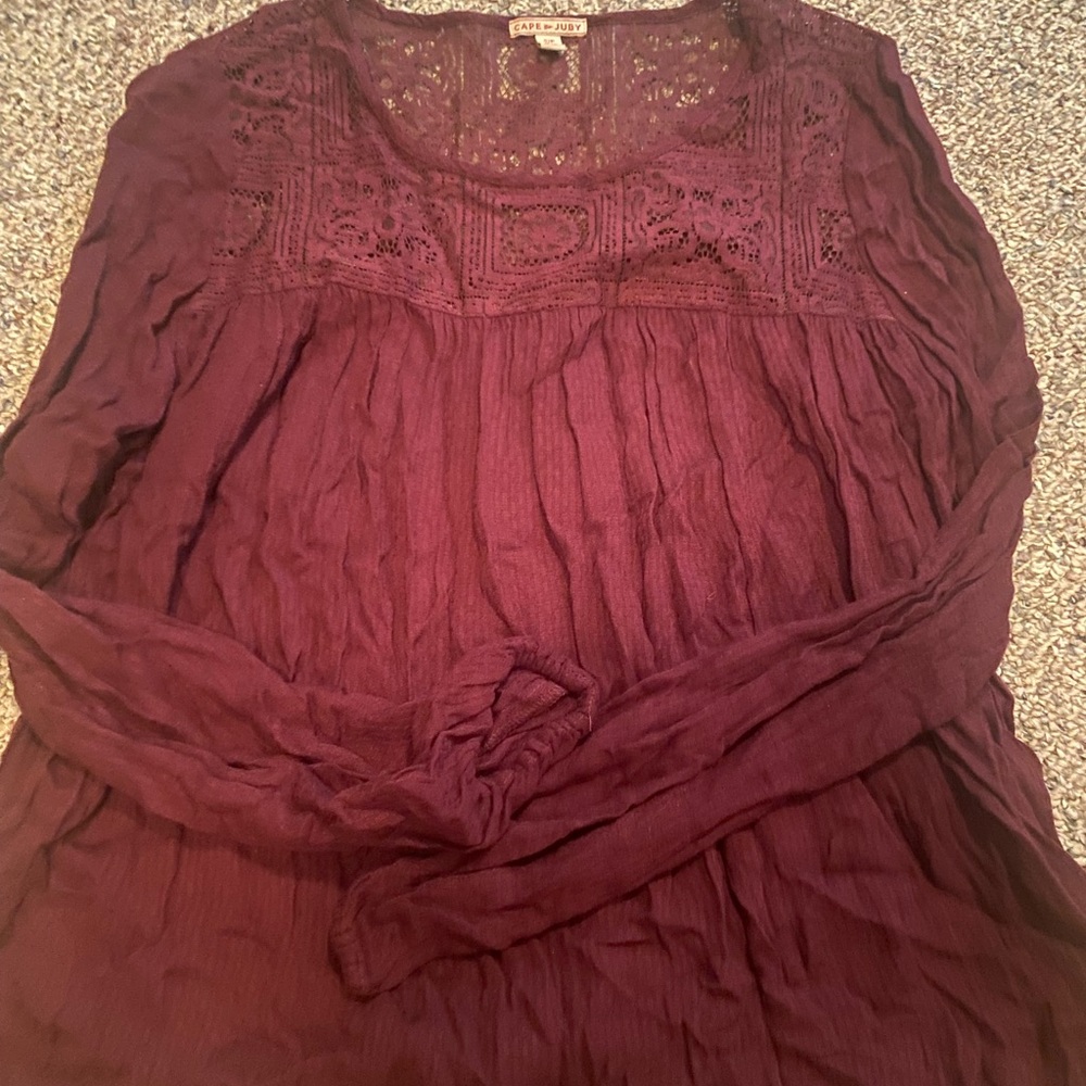 Loose in the body with lace detail on top